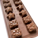 Mold with various Christmas shapes - Bells, Stars, Gift Packages