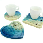 Set of 4 round wooden coasters, 11 cm diameter.